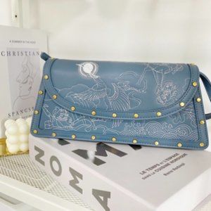 Embroidered underarm baguette handbag